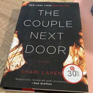 Hardcover “the couple next door”
